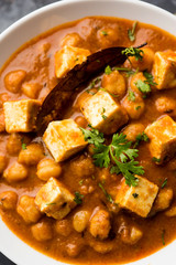 Chole Paneer curry made using boiled chickpea with cottage cheese with spices. Popular North Indian recipe. served in a bowl or serving pan. Selective focus