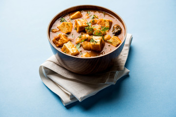 Chole Paneer curry made using boiled chickpea with cottage cheese with spices. Popular North Indian recipe. served in a bowl or serving pan. Selective focus