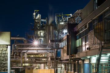 Detailed view of a chemical plant at night. Work at night. Urban landscape in Gouda, The Netherlands.