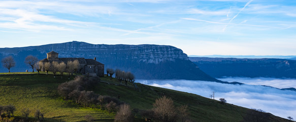 Fototapeta premium Sanctuary of San Miguel de Aralar high up between mountains and clouds, Navarre