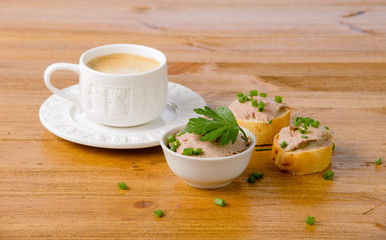 healthy breakfast with coffee and sandwiches, on a wooden table