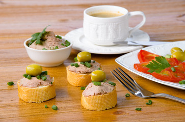 healthy breakfast with coffee and sandwiches, on a wooden table