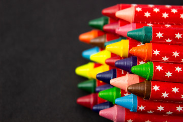 Close-up of colourful stack of crayons