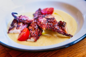 Mediterranean Octopus with vegetables and potatoes