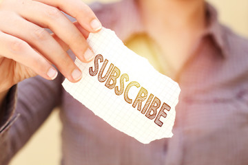 business woman holding tear paper with Email subscribe concept