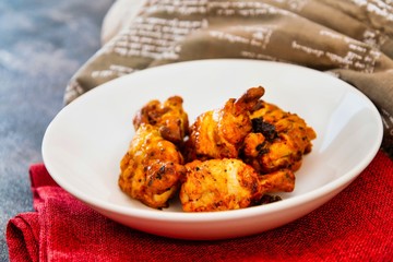 roasted sleeves chicken with potatoes and barbecue sauce