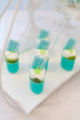Candy bar. Delicious dessert with cream. Snack on the table. Catering. Closeup