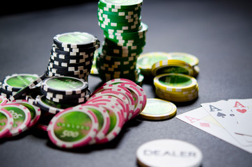 on a black background, big bet for playing cards on money