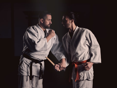 Man blocking knife attack during training