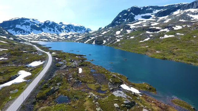 aerial view of beautiful mountainside at western norway with a small road