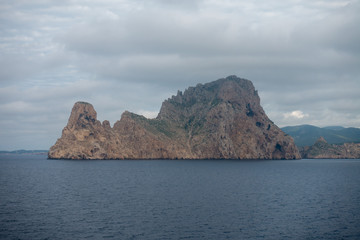 Fototapeta na wymiar The island of es vedra from behind from a boat