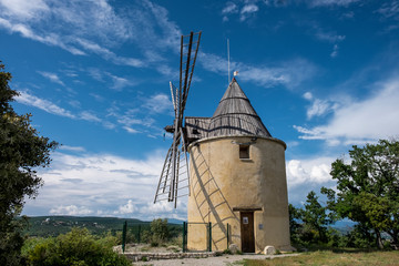 old windmill near the village of Saint Michel observatory in the Luberon, France