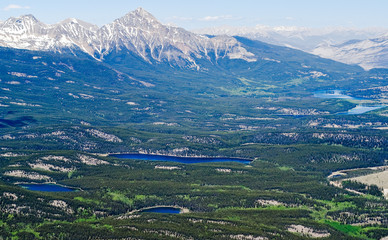 Fototapeta na wymiar Aerial view of Jasper lakes and Pyramid mountain from the top of Whistler mountain - Jasper national park, Alberta, Canada