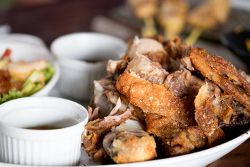 Crispy fried pork leg placed on a plate