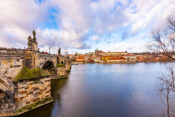 Prague city scape panoramatic view of Prague castle (Hradcany in local speak). Near Charles bridge over the Vltava river. Prague is czech capital
