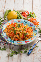 pasta with capsicum tomatoes and mint leaf