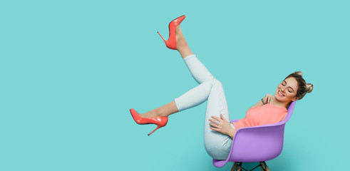 woman wearing living coral color high heel, trendy high heel