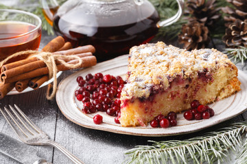 Christmas gingerbread cake among traditional decorations