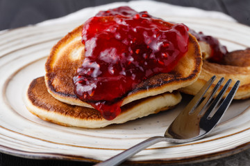 Close up image of pancakes with jam