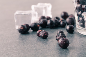 Frozen berry on black background. Frozen fruit