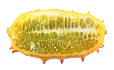 Ripe yellow horned melon or kiwano fruit cut in half lengthwise isolated on white background