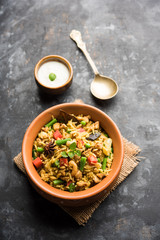 Kheema Pulao - Rice cooked with mutton or chicken mince with vegetables and spices. served in a bowl. selective focus
