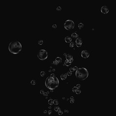 White air bubbles isolated on black background. Underwater oxygen. Soap closeup.
