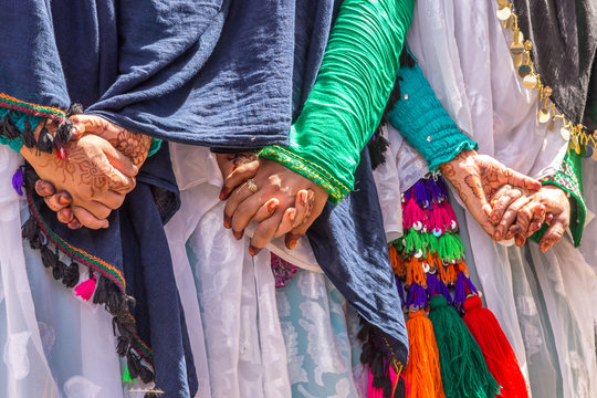 Henna Paint on women hand. Berber Wedding in Merzouga, Morocco