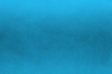 Ocean blue textile background. Silk cloth texture. Fabric jeans pattern.