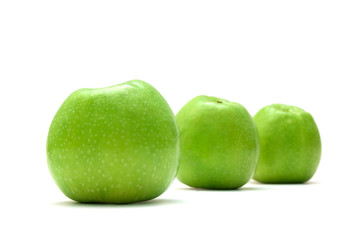 Green apples isolated on a white background.