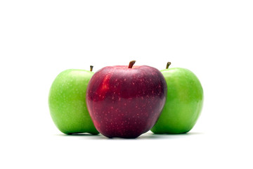 Three green and red apples isolated on a white background.