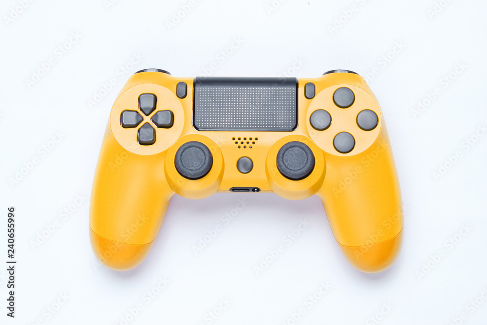 Canvas Prints modern yellow gamepad (joystick) on gray background. top view.