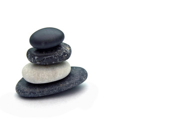 Balancing stones isolated on white background.
