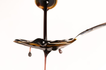 Pouring Soy Sauce on a Spoon