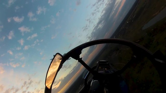 Two pairs of fighters disperse in the sky
