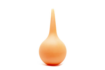 orange rubber enema isolated on a white background
