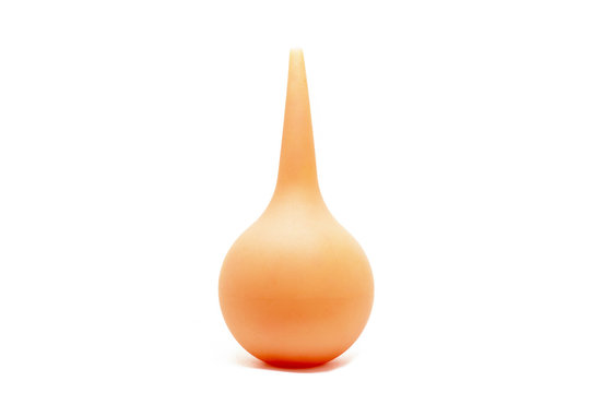 orange rubber enema isolated on a white background
