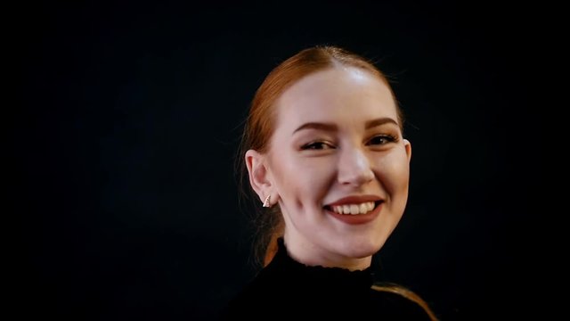 Photosession. Portrait of young pretty woman model. Red hair, bronze make up, dark lipstick. Smiling and laughing