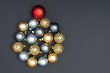 Multiple Christmas silver and gold baubles creative circle decoration with the black background and copy space