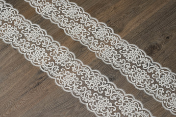 a background image of ivory-colored lace cloth