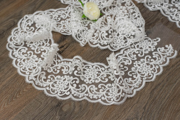 a background image of ivory-colored lace cloth