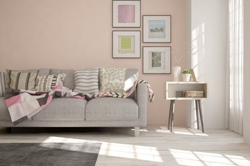 Fototapeta premium Idea of white minimalist room with sofa. Scandinavian interior design. 3D illustration