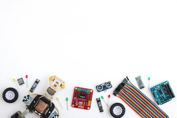 A metal robot and an electronic board that can be programmed. Robotics and electronics. DIY...