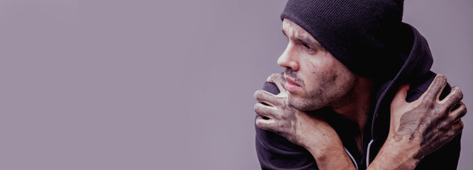 Body language of the man as a symbol of loneliness and depression. Negative emotion, gestures,...