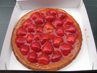 a delicious strawberry flan in a box closeup of a confectionery in Belgium