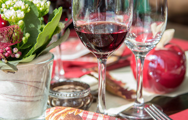 Red wine glass on the dining table