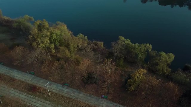Aerial footage over Echo Park Lake, Kishinev, Moldova republic of. View of lake and smille bridge.