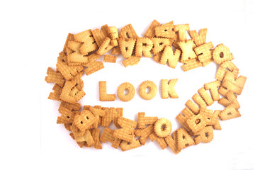 word LOOK made of cookies isolated on white