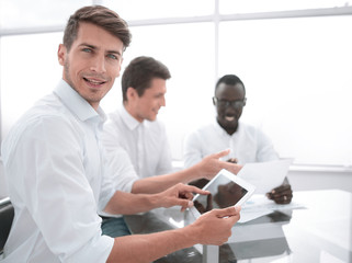 Fototapeta premium close up.businessman using digital tablet in office
