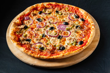 pizza on the black background